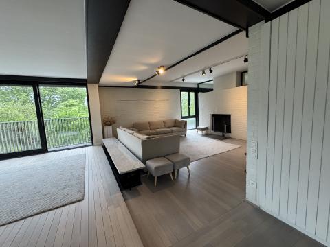 Bright modern penthouse bedroom for student rental, with shared common space, near Howest Kortrijk