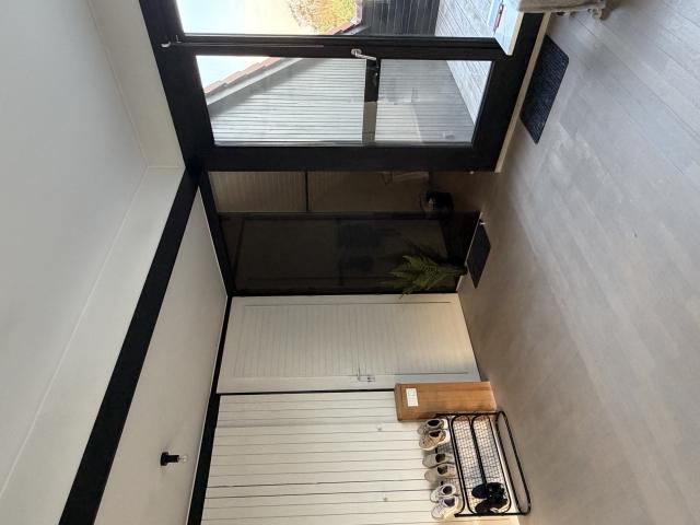 Bright modern penthouse bedroom for student rental, with shared common space, near Howest Kortrijk