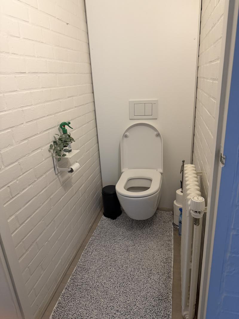 Bright modern penthouse bedroom for student rental, with shared common space, near Howest Kortrijk