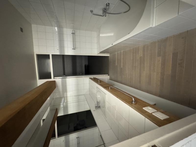 Bright modern penthouse bedroom for student rental, with shared common space, near Howest Kortrijk